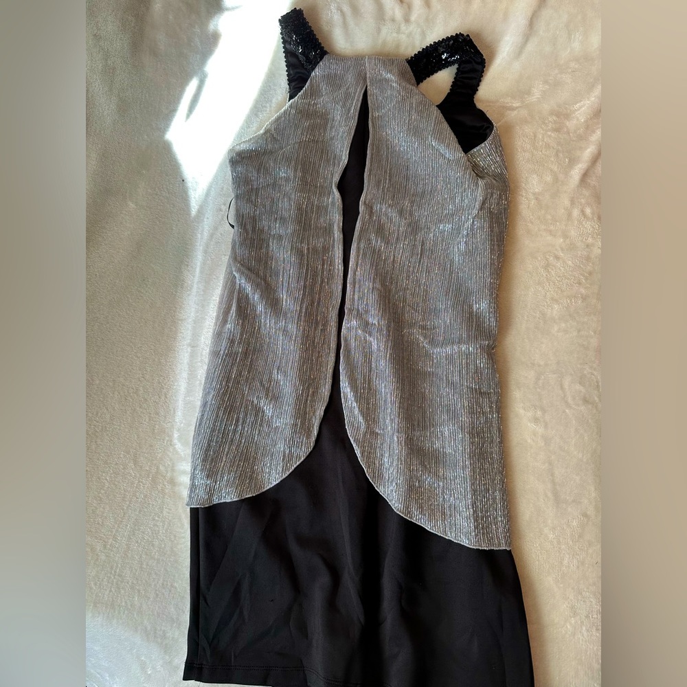 Black sequin draped dress with silver flow flaps 😂